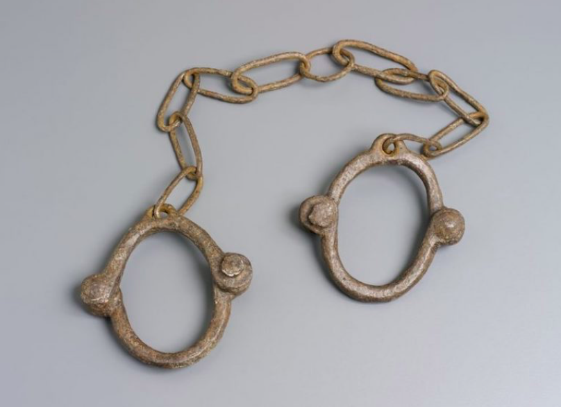 Figure 21. “Convict iron leg manacles” by Unknown. ca. 1772-1886, Australia. Museum of Applied Arts and Sciences.